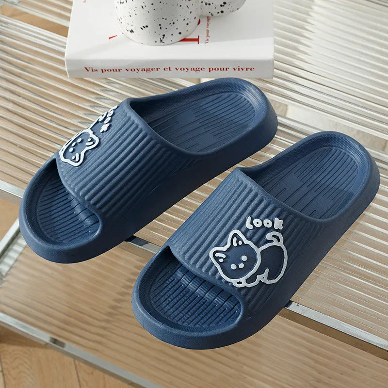 Green EVA foam cat slippers with thick platform sole and anti-slip pattern.