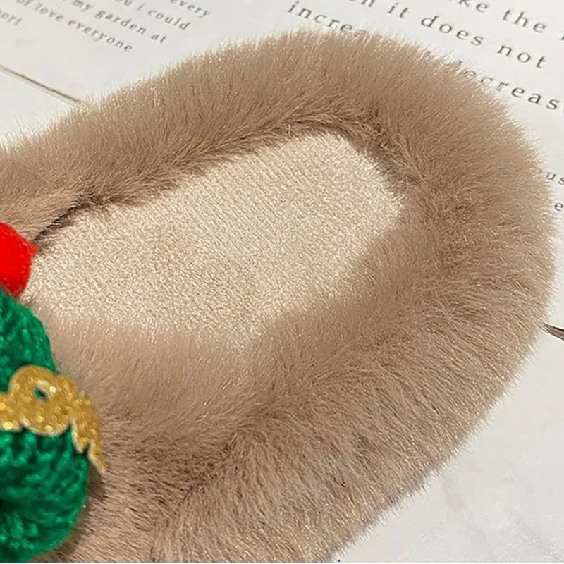 Women's Christmas hat design slippers with hairy plush cuff, cotton lining, and rubber sole.