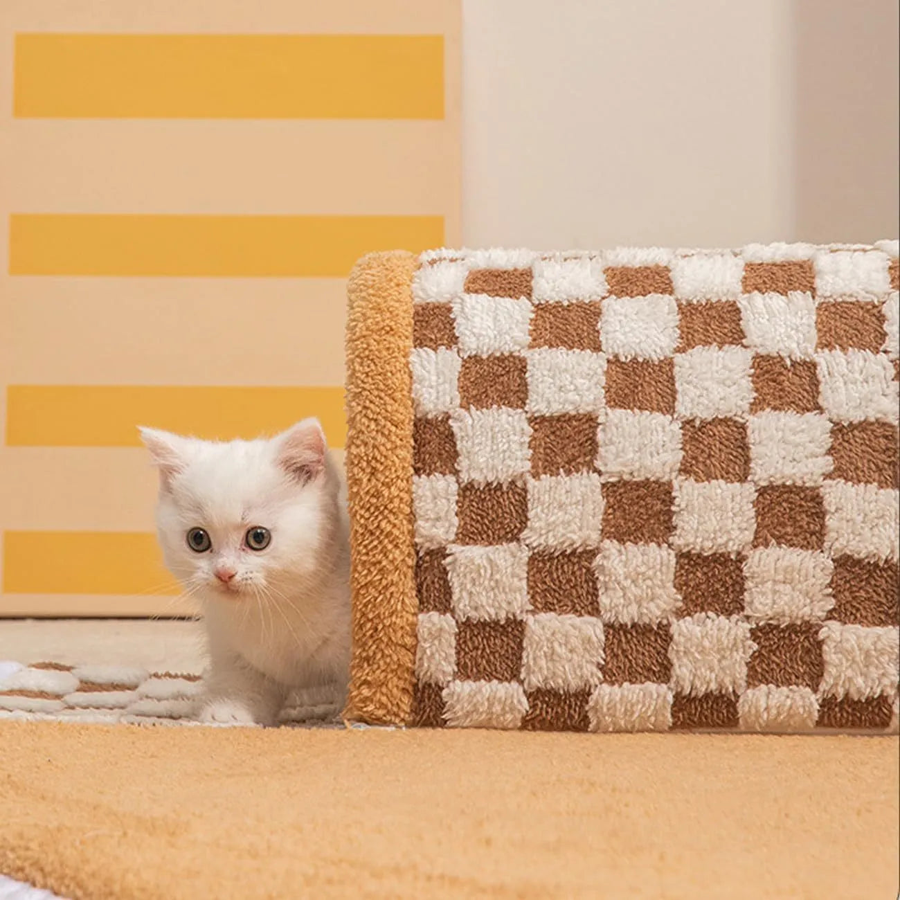 Large fan-shaped plush pet bed with attached tunnel in coffee colour on a wooden floor