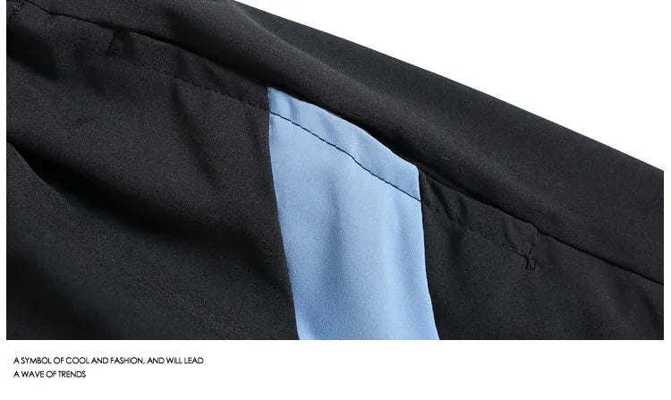 Men's loose fit quick-drying sports shorts with elastic waist in black and grey colours