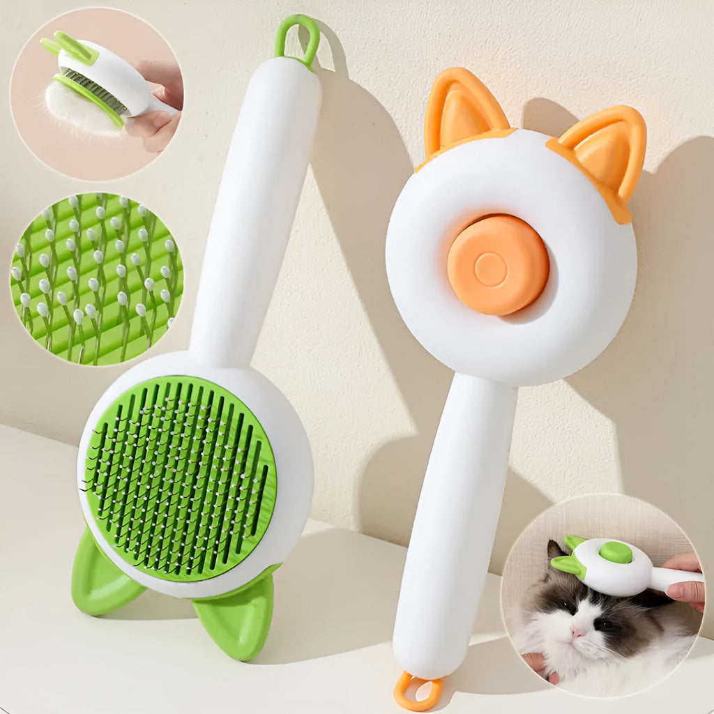 Self-cleaning cat grooming comb in greenish white and orange white colour options