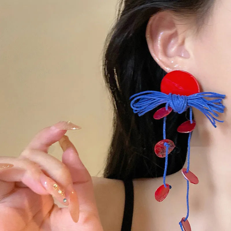 Women's geometric cloth earrings with silver needle colour and blue resin flower accents