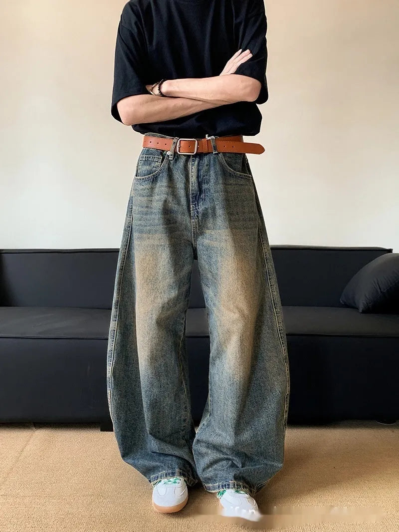 Men's retro blue distressed jeans with wide-leg cut and micro-elastic cotton blend fabric