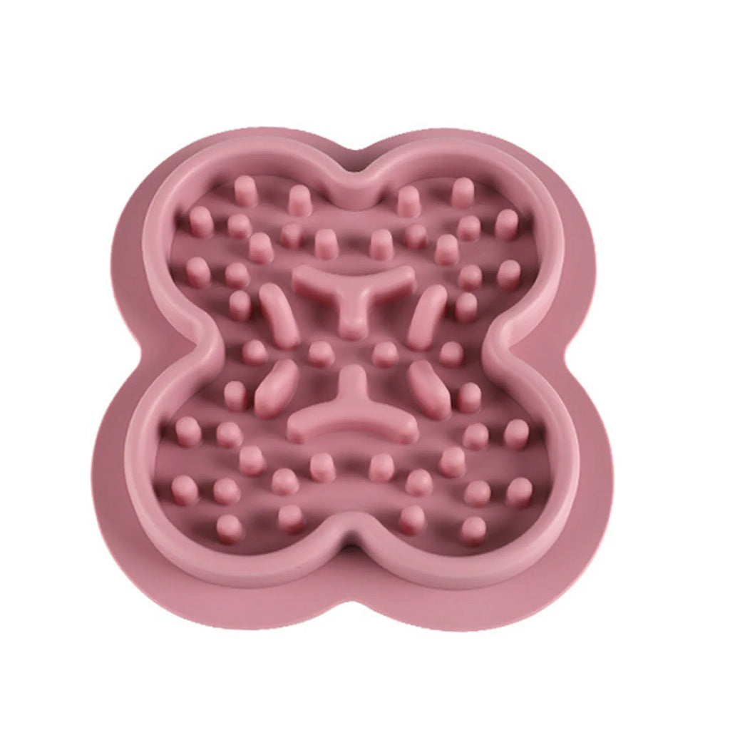 Silicone pet licking pad slow feeder mat in green colour with textured surface, showing scale.