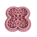 Silicone pet licking pad slow feeder mat in green colour with textured surface, showing scale.