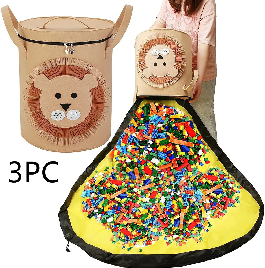 Green cube-shaped felt storage bag with a pull rope, shown as a toy organiser and play mat.
