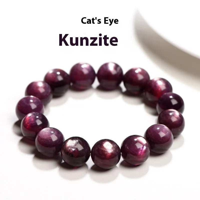 Purple lepidolite crystal round bead bracelet with polished finish on a wrist.