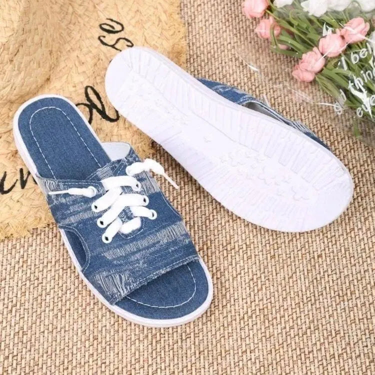 Blue Roman-style women's canvas slippers with cloth upper and rubber sole