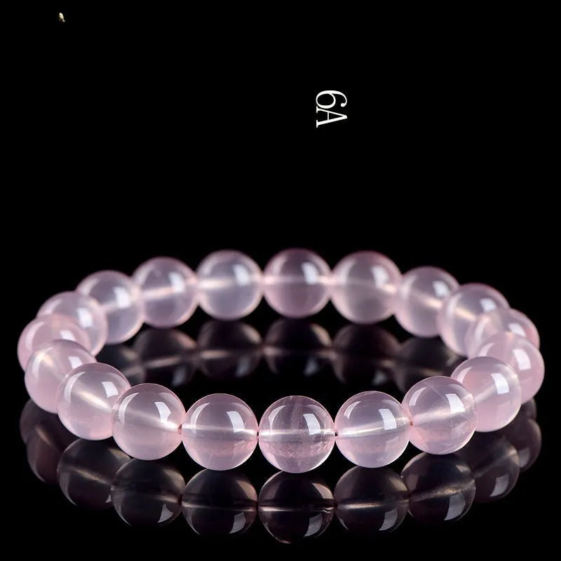 Natural starlight crystal round bead bracelet with pink star colour options and measured bead sizing