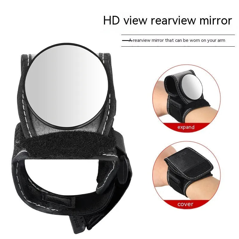 Black nylon wrist-mounted bicycle rear-view mirror with adjustable angle and secure strap for handlebar installation