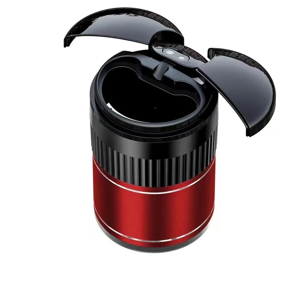 Black automatic sensing touch infrared metal car ashtray with lid on a car console.