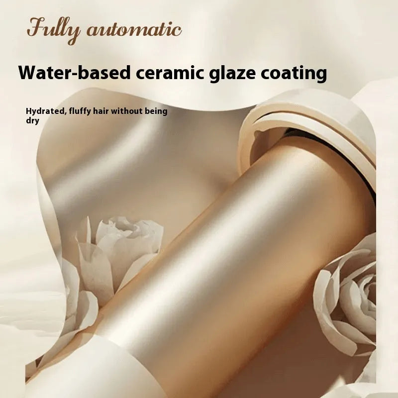 White automatic hair curler with 32mm ceramic barrel and international plug adapters