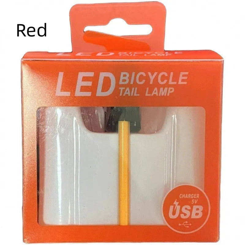 USB-charging waterproof bicycle rear taillight in blue, pink, red, white, or yellow colour options
