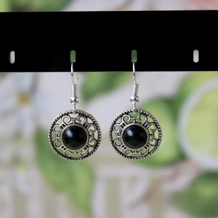 Miao silver ethnic earrings with turquoise geometric flower disk and auspicious patterns