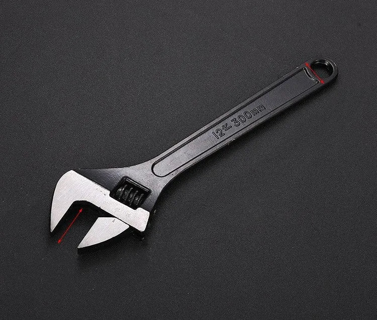 High carbon steel adjustable open-end wrench with blackened finish on a grey background.