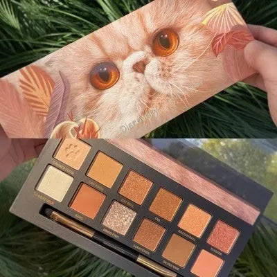 Explorer twelve-colour animal themed pressed powder eye shadow palette open to show shades