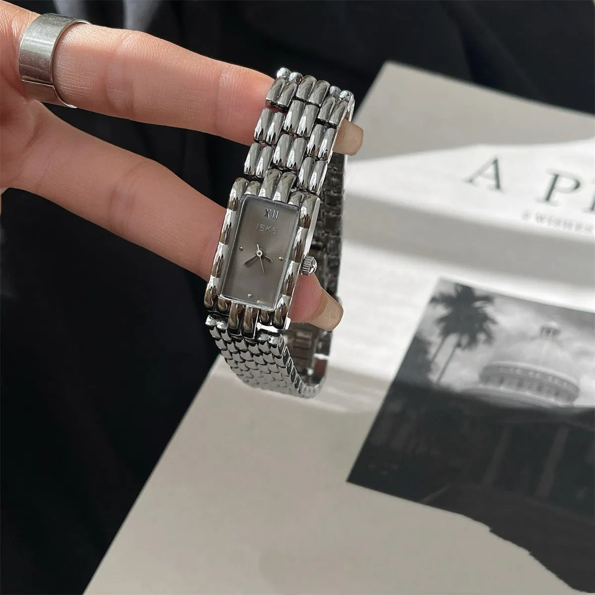 Women's mid-century inspired bracelet watch with 15mm dial and butterfly clasp buckle
