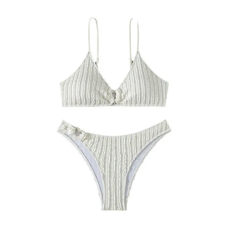 White women's V-neck beach swimsuit with sleeveless design and split cut