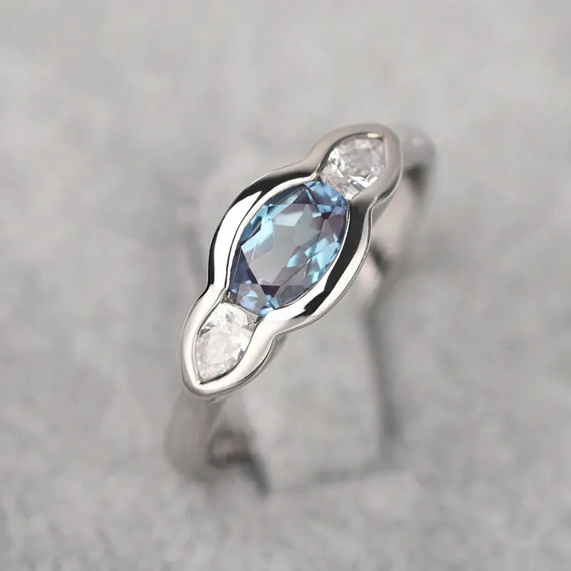 Geometric ellipse zircon ring in white gold colour showing contemporary design