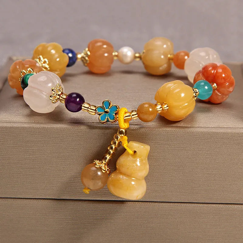 Khaki yellow agate crystal bracelet for women with gold silk threading.