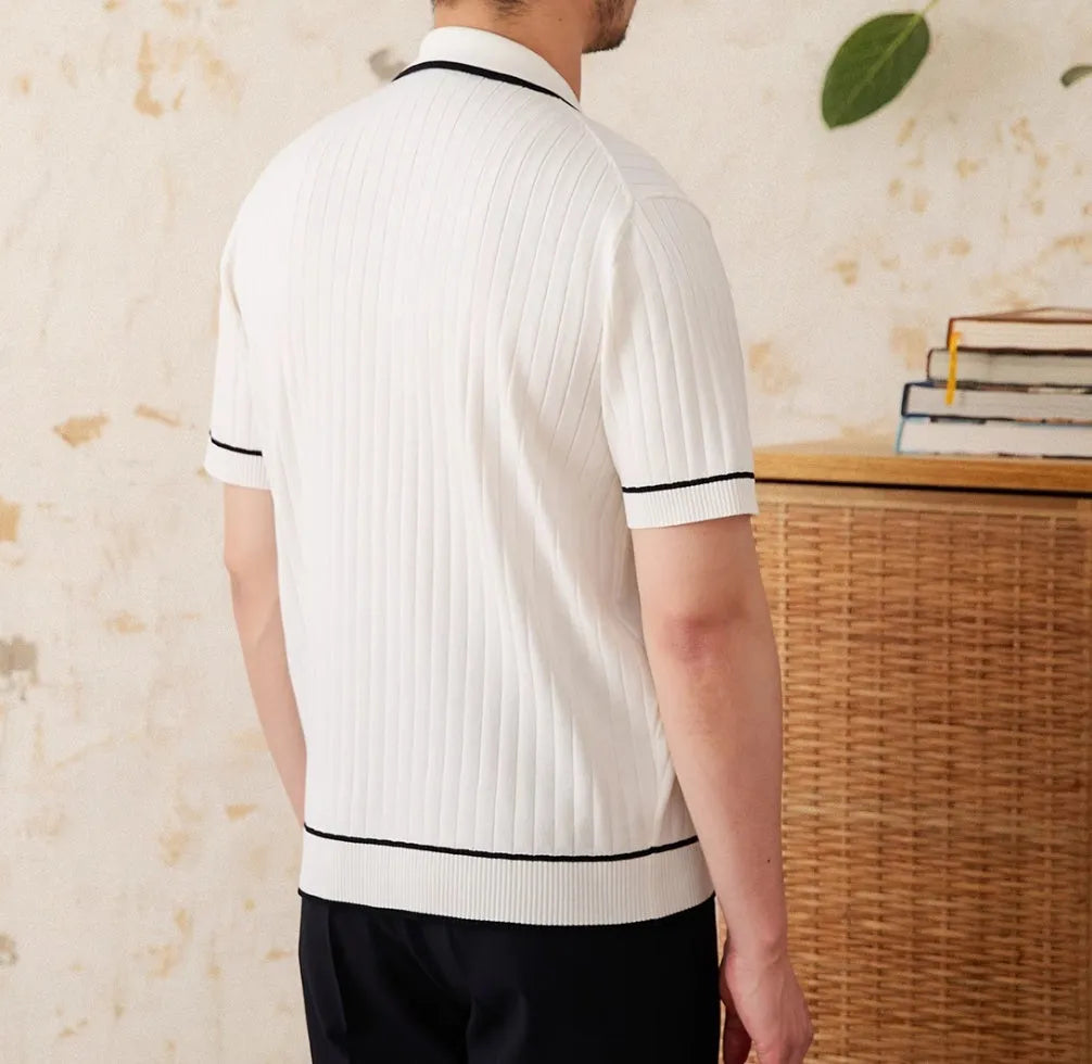 A black slim-fit lapel polo shirt with short sleeves, made from a thin knitted fabric.