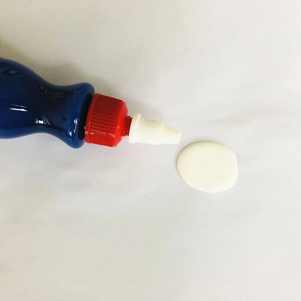 Small blue tube of car scratch repair gel for automotive paint touch-ups.