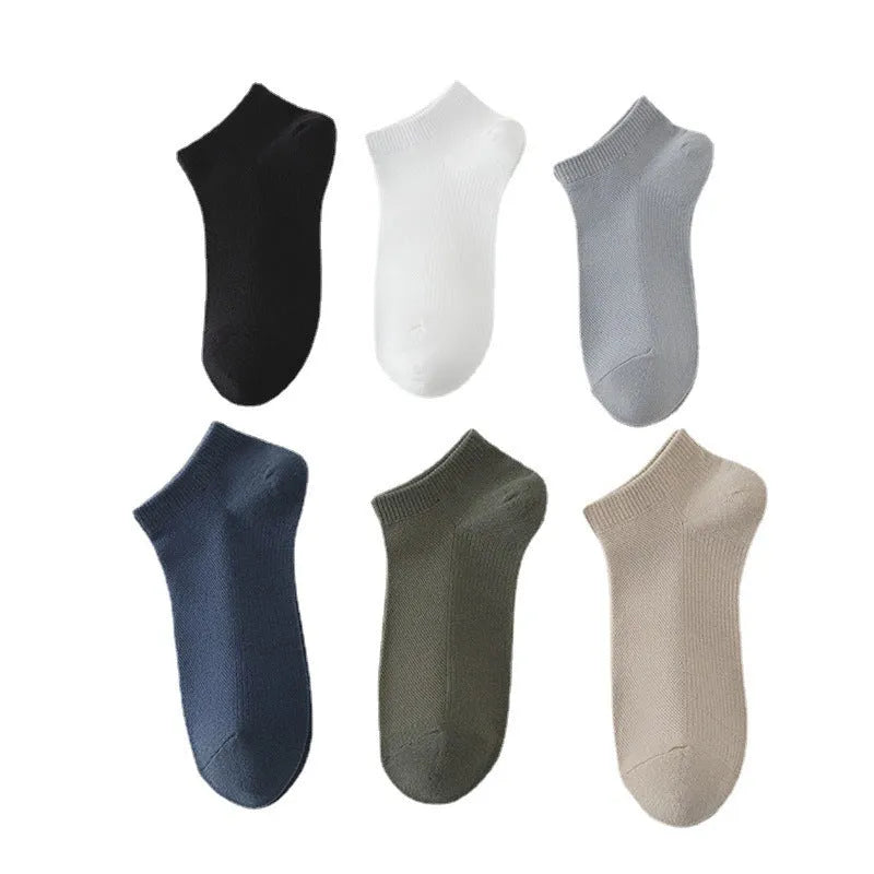 Men's solid colour polyester low-cut boat socks shown in multiple colour options