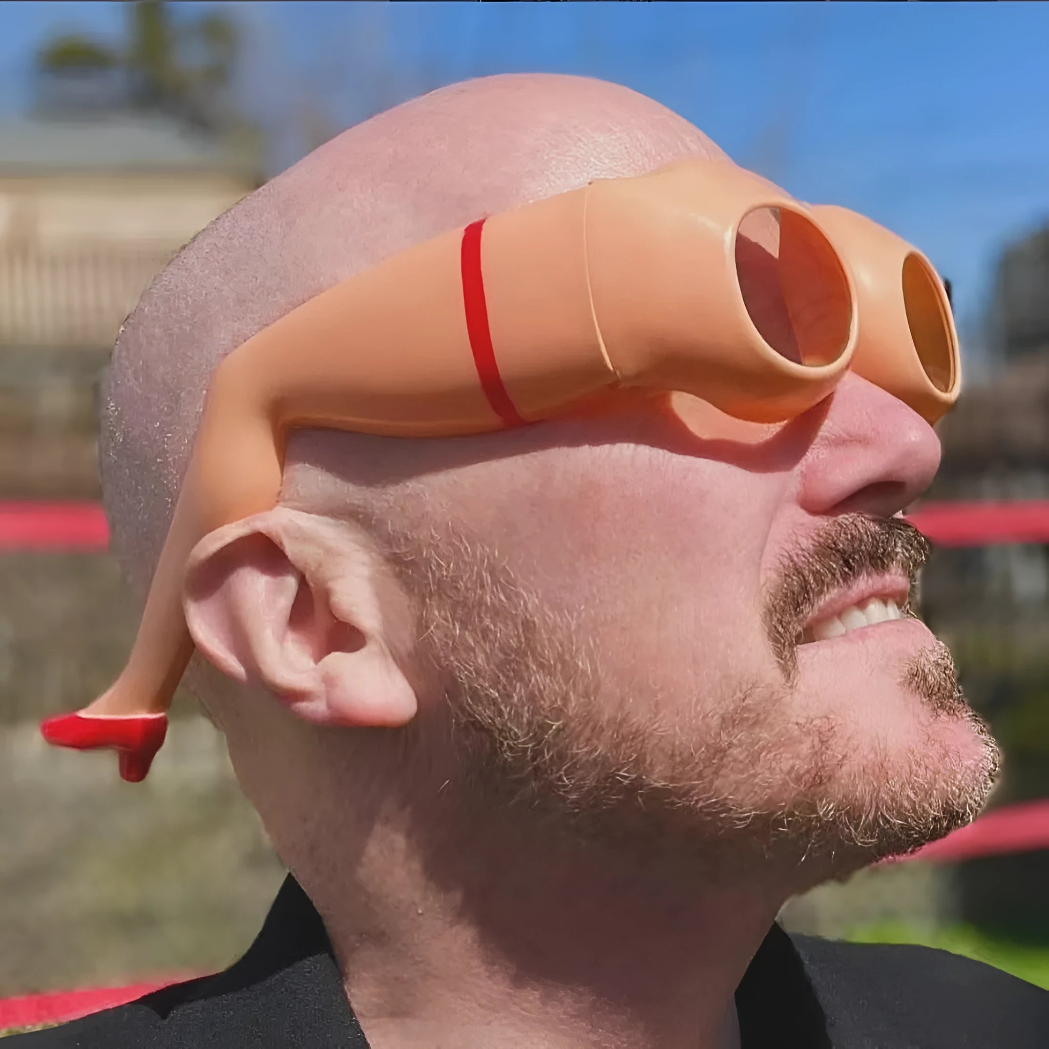 Orange oversized personality sunglasses with plastic frame, shown from front.