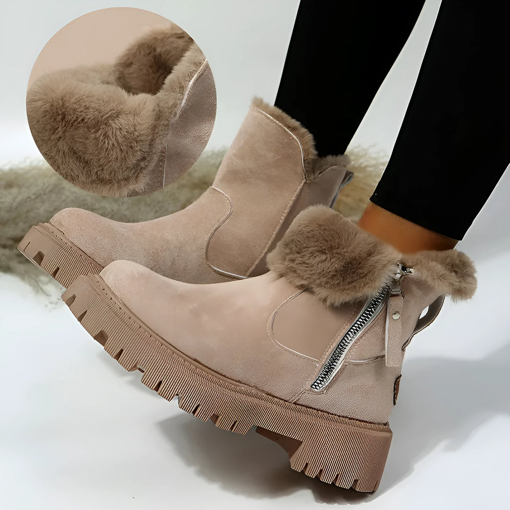 Women's black high-top snow boots with side zipper and round toe, made from cow suede.