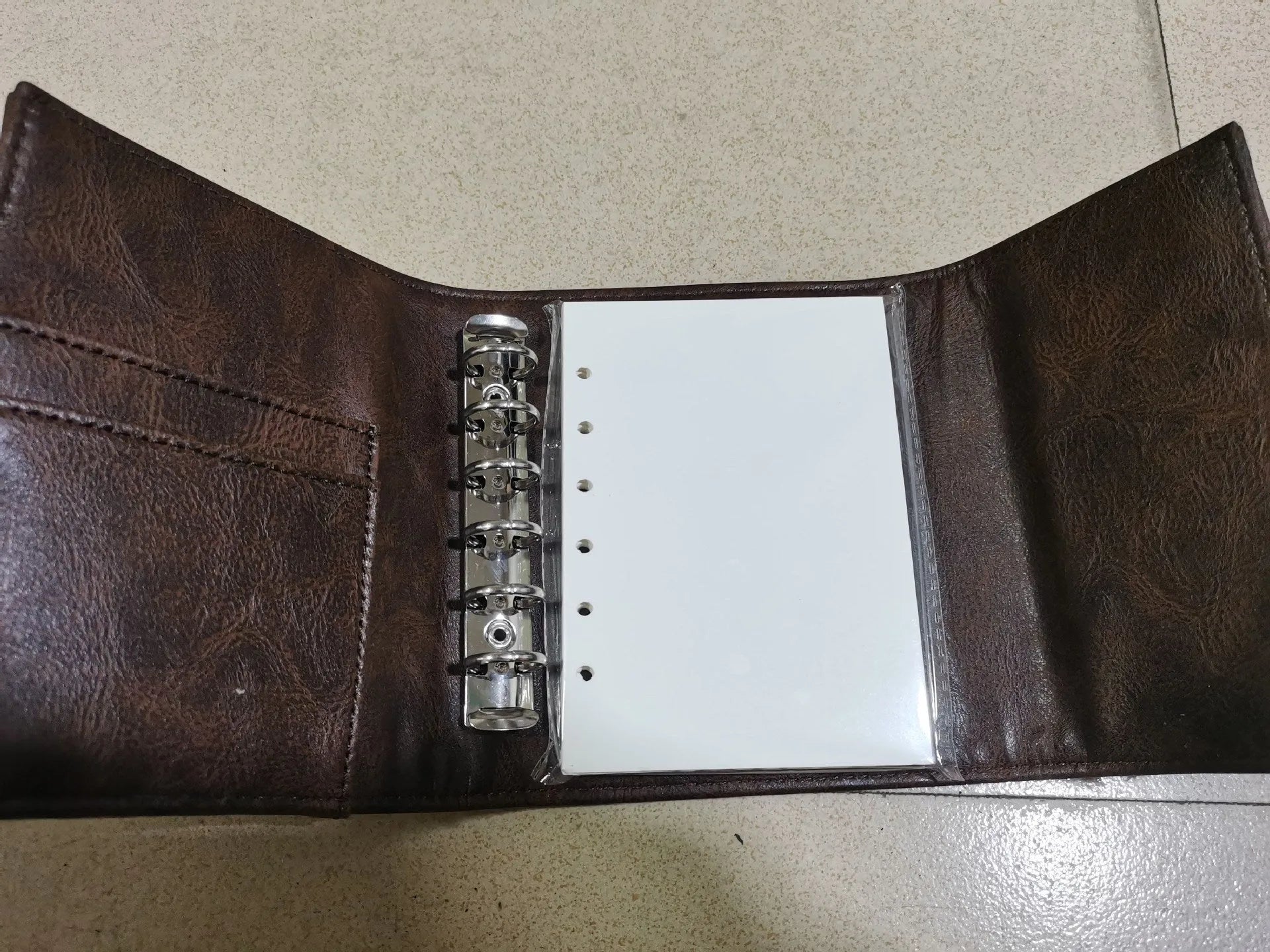 Brown retro leather buckle notebook with A7 size and loose-leaf binding