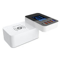 White multi-port wireless charger with USB ports measuring 64.5x98.6x56.5mm