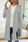 A loose-fitting long sleeve knitted cardigan jacket for plus sizes, shown in black, gray, or wine red.