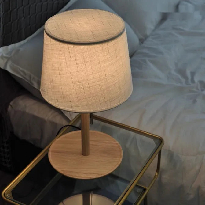 Walnut finish solid wood bedside lamp with fabric shade and cable switch