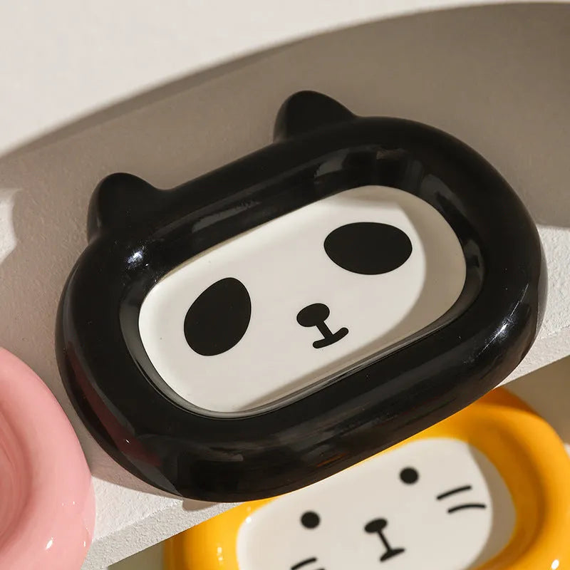 Ceramic pet bowl with an animal design, shown on a table