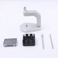 Silver multi-purpose press strap removal tool with a pointed blade for watch and jewellery repair.