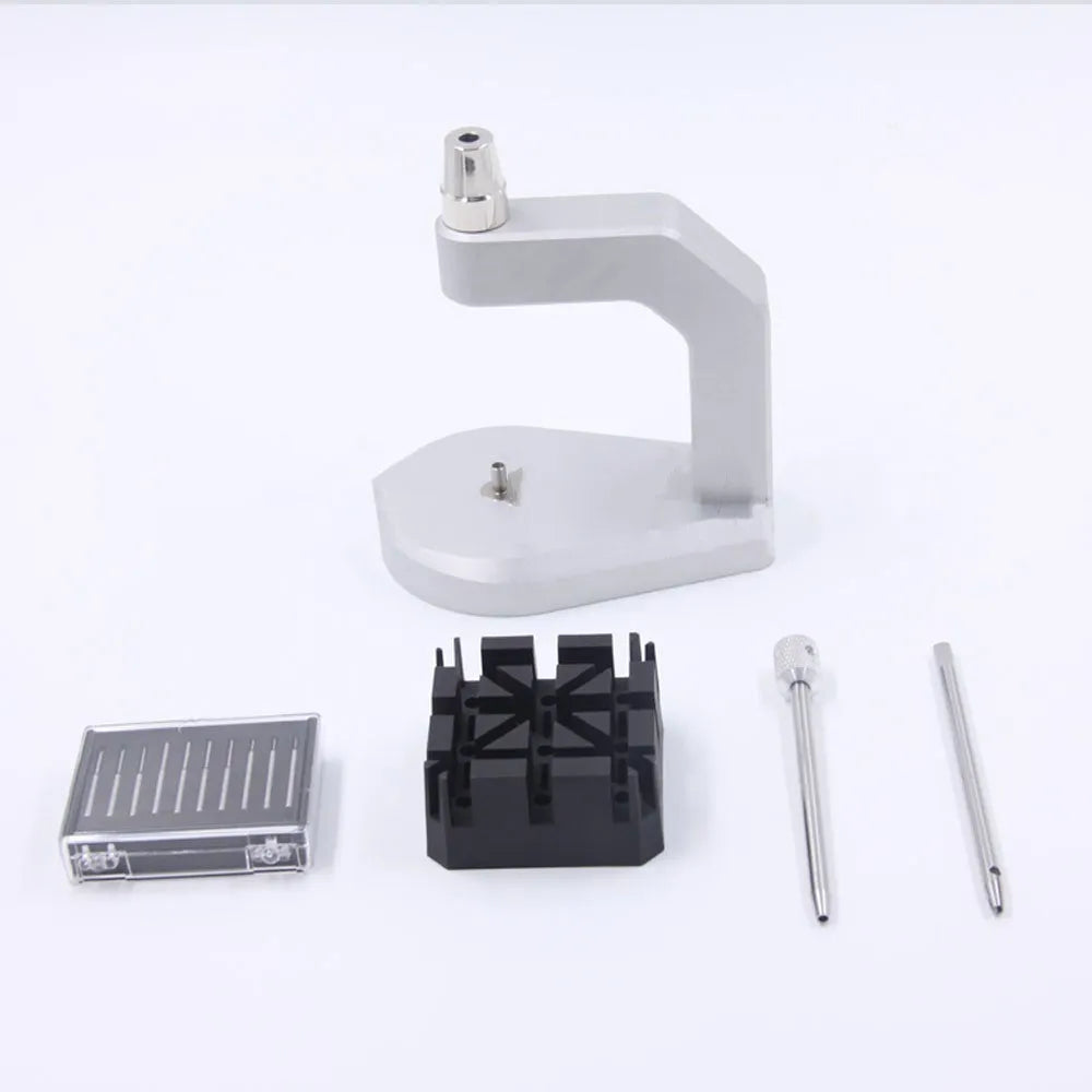 Silver multi-purpose press strap removal tool with a pointed blade for watch and jewellery repair.