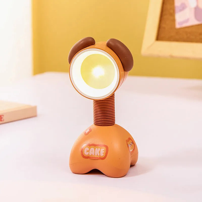 DIY magnetic cartoon small night lamp with multi-angle adjustable lighting on desktop