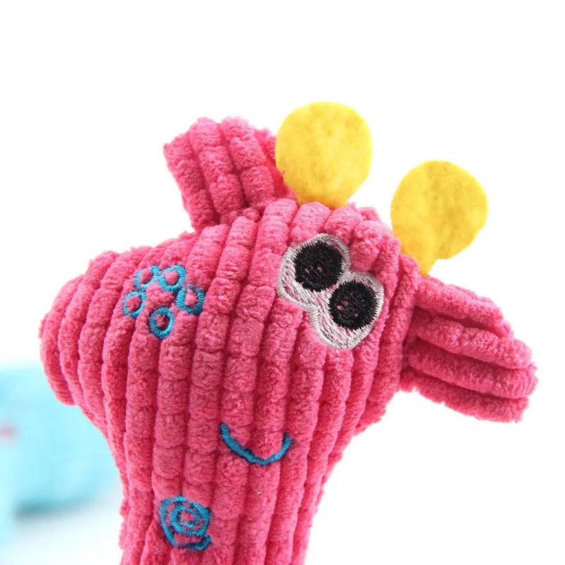 Blue deer-shaped plush dog toy with corn grain texture, shown next to a measuring tape indicating 24 cm length.