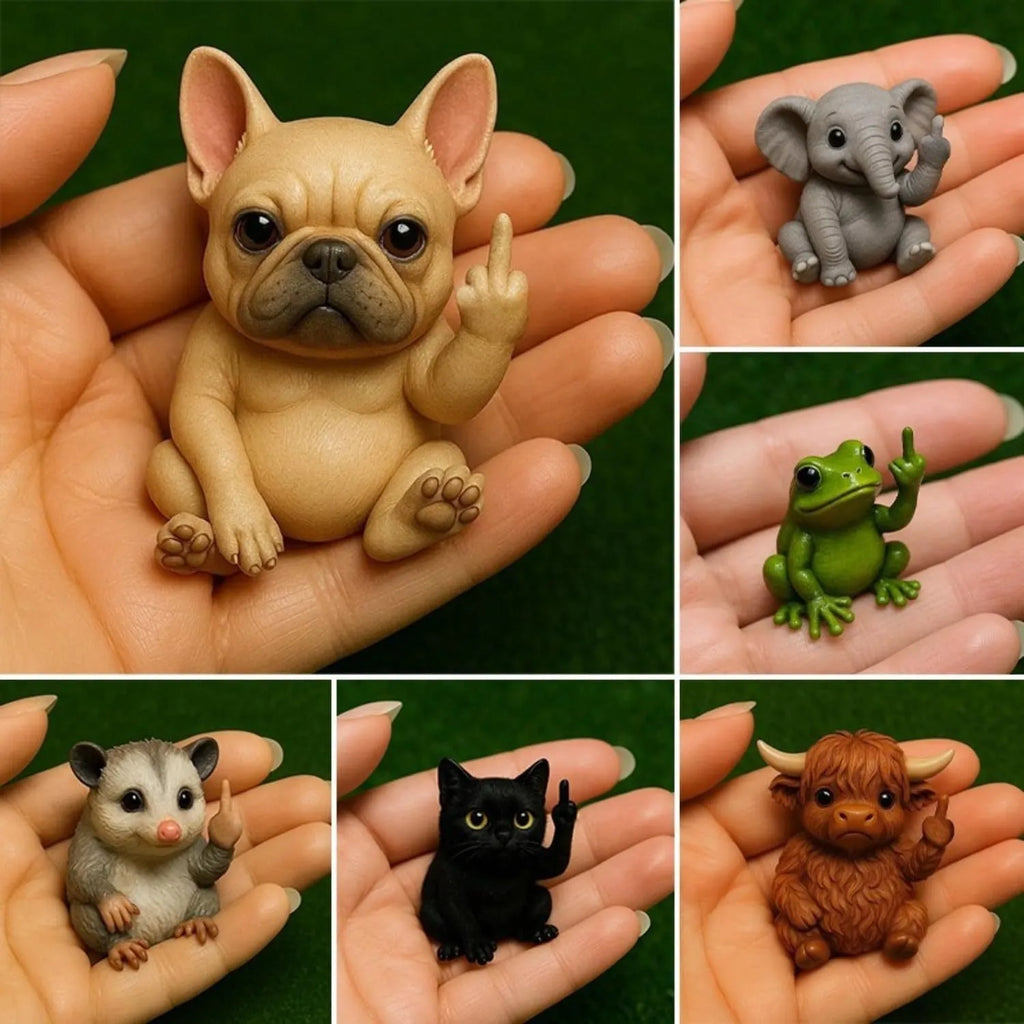 Mini animal-themed vertical middle finger doll ornament in resin and plastic on a desk.