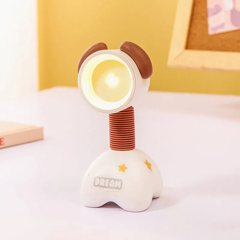 DIY magnetic cartoon small night lamp with multi-angle adjustable lighting on desktop