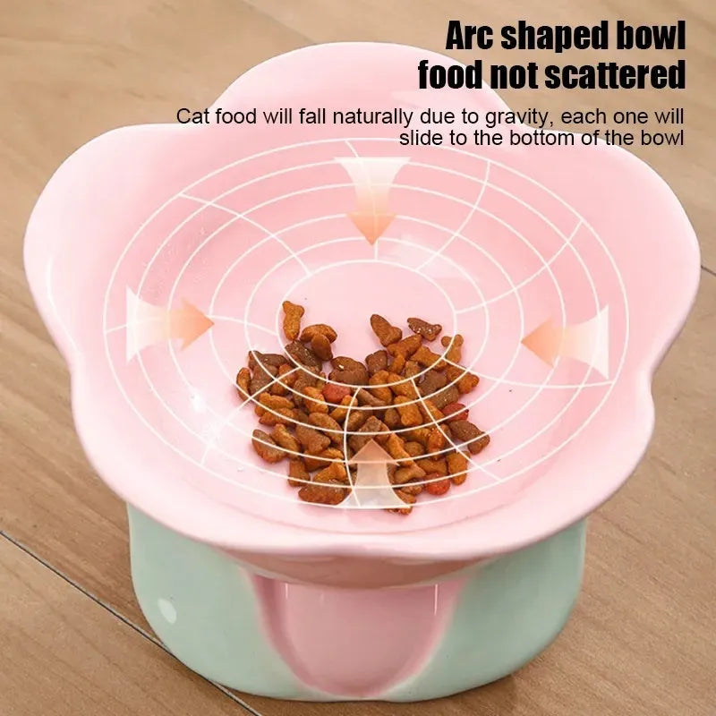 Blue floral patterned ceramic raised bowl for cats or small dogs on a non-slip base.