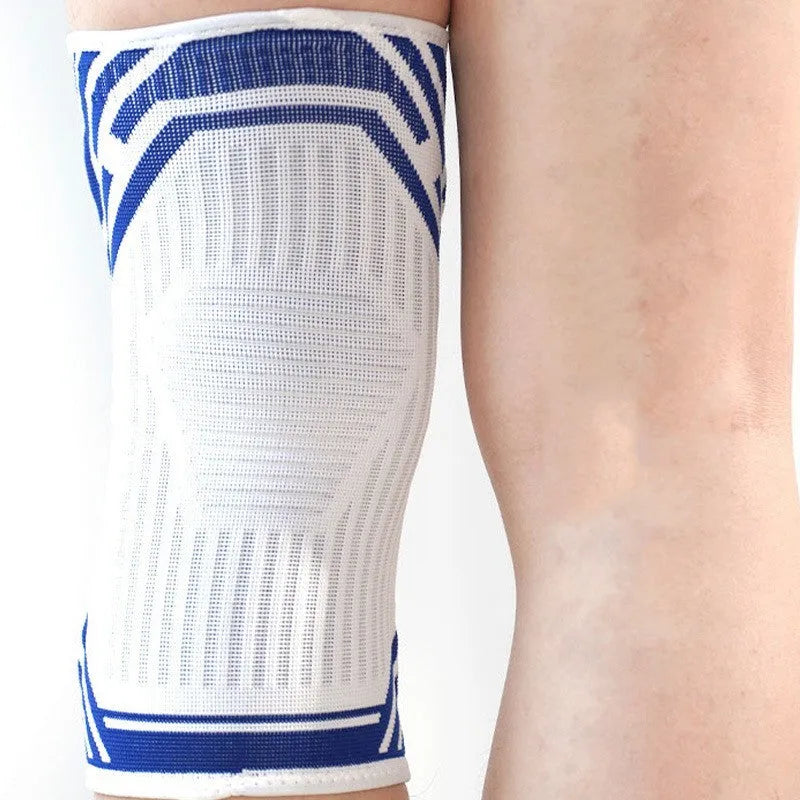 A pair of blue high-elasticity cotton knee pads for adult sports like basketball and running.
