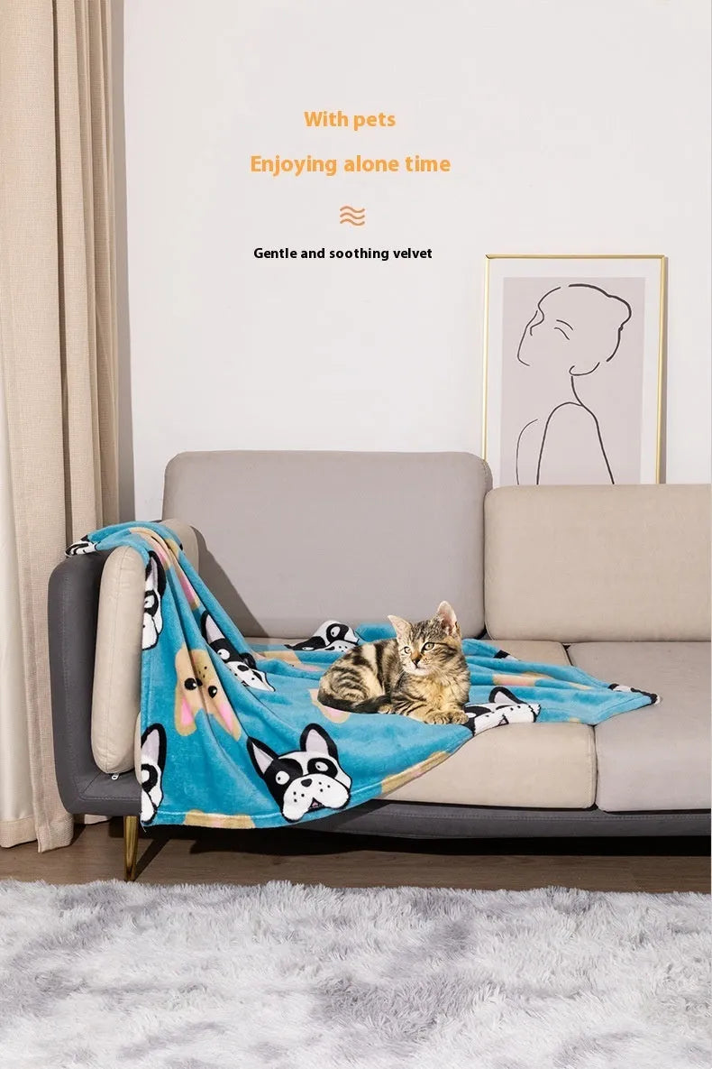 Blue dog cartoon print pet blanket laid flat, showing double-sided flannel texture.