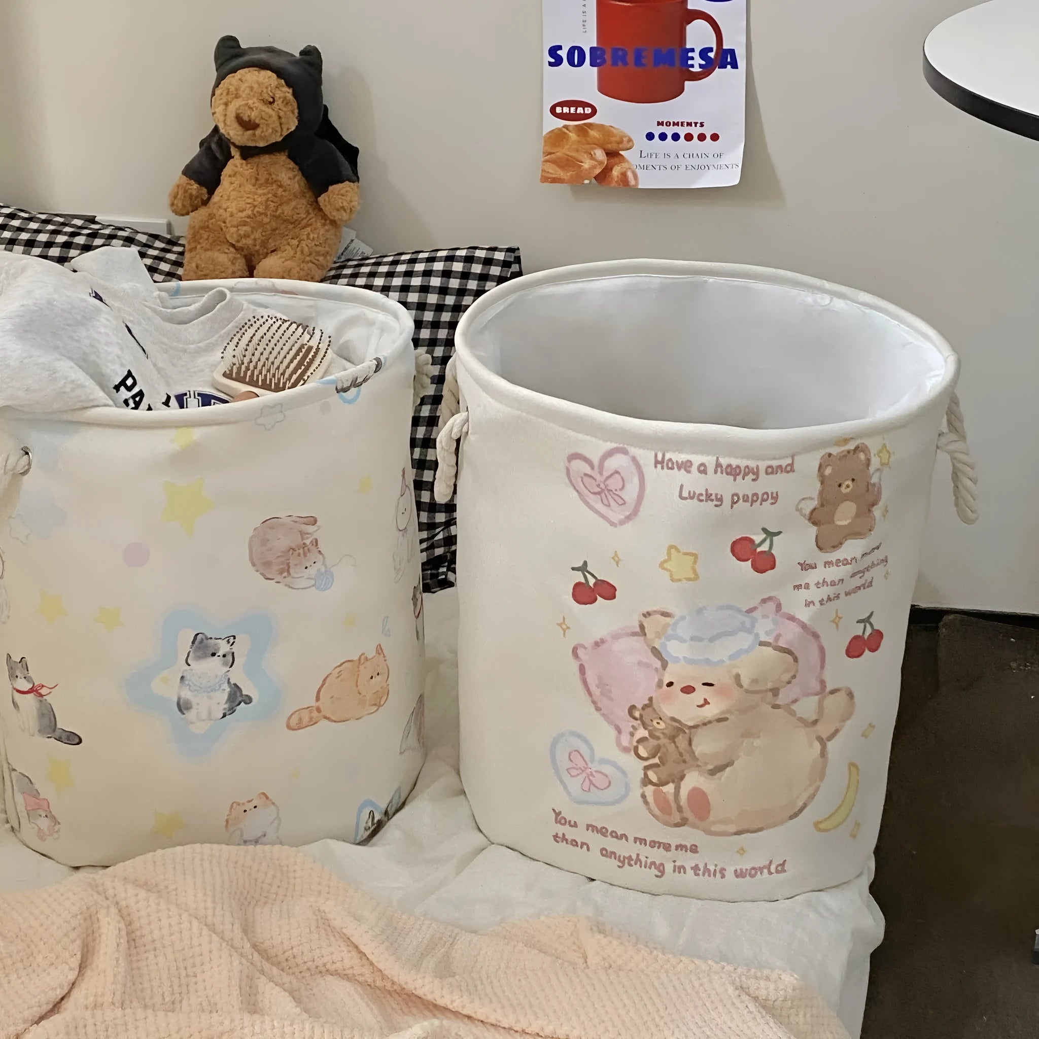 Foldable cotton cloth laundry basket in a character print colour, shown unfolded for use.