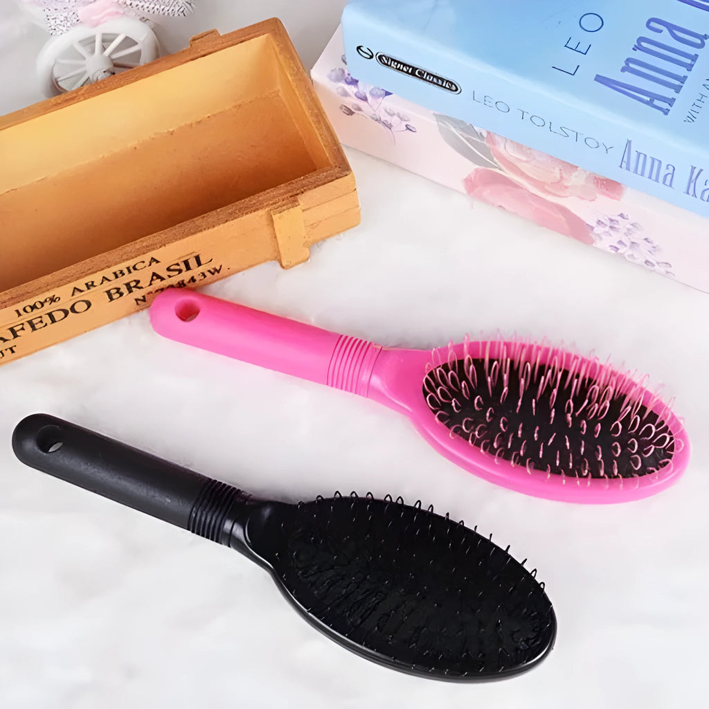 Black ring tooth hair extension comb with airbag cushion measuring 22cm long