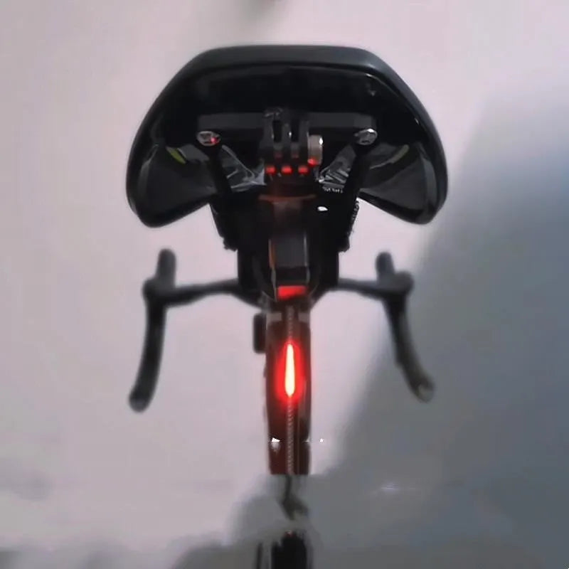 USB-charging waterproof bicycle rear taillight in blue, pink, red, white, or yellow colour options