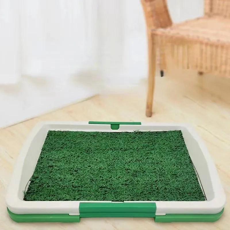 Green artificial grass dog toilet tray with three layers for indoor puppy potty training.