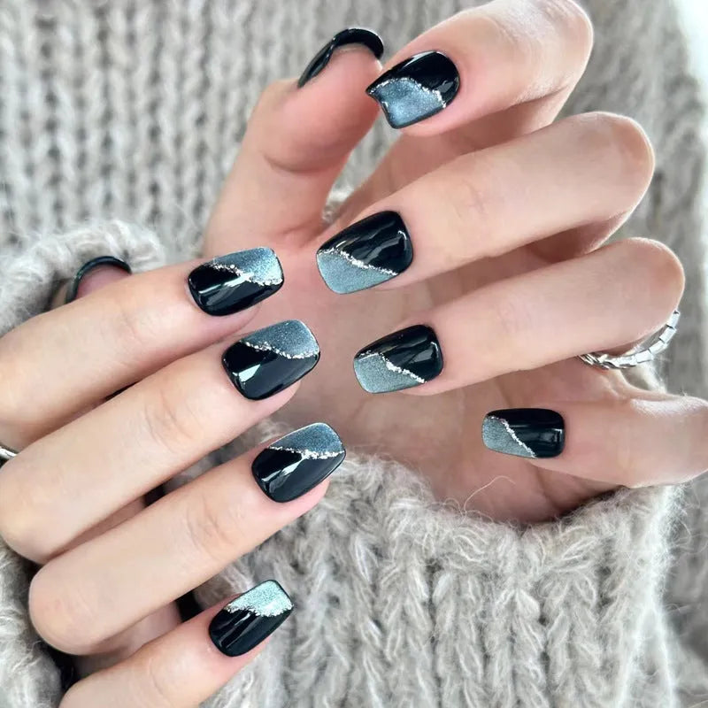 Sweet Girl Wearing Fake Nails press-on artificial nail sets in random colours for DIY application.