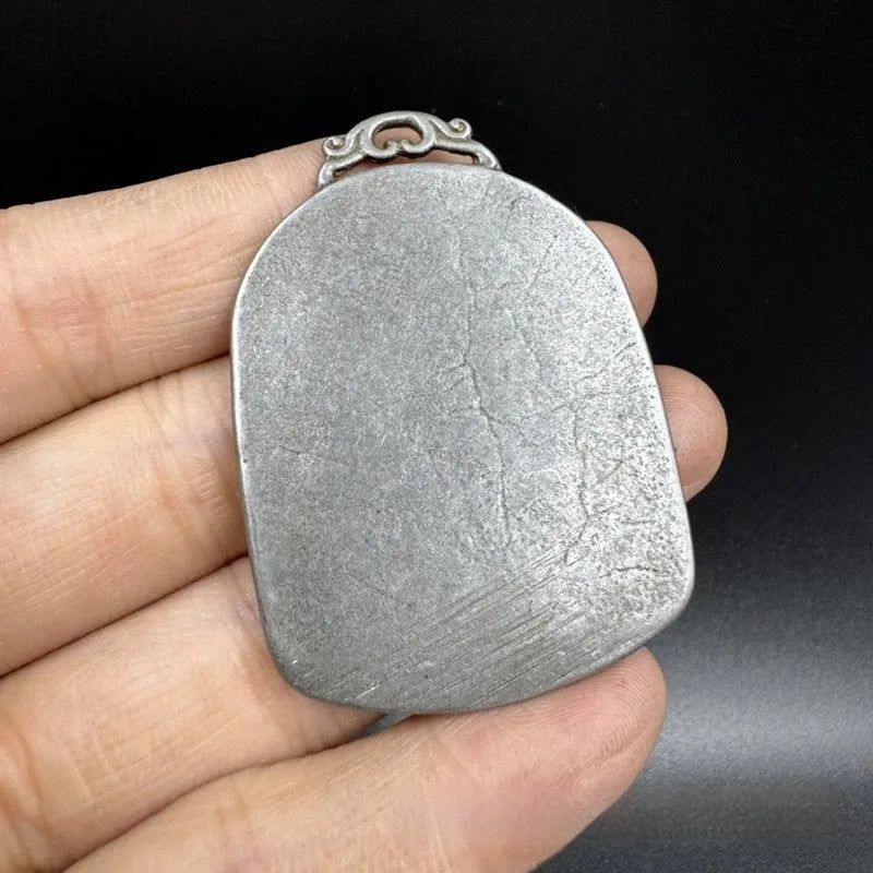 Iron metal pendant with Chinese geometric design depicting Yamantaka Aryaacalanatha deity