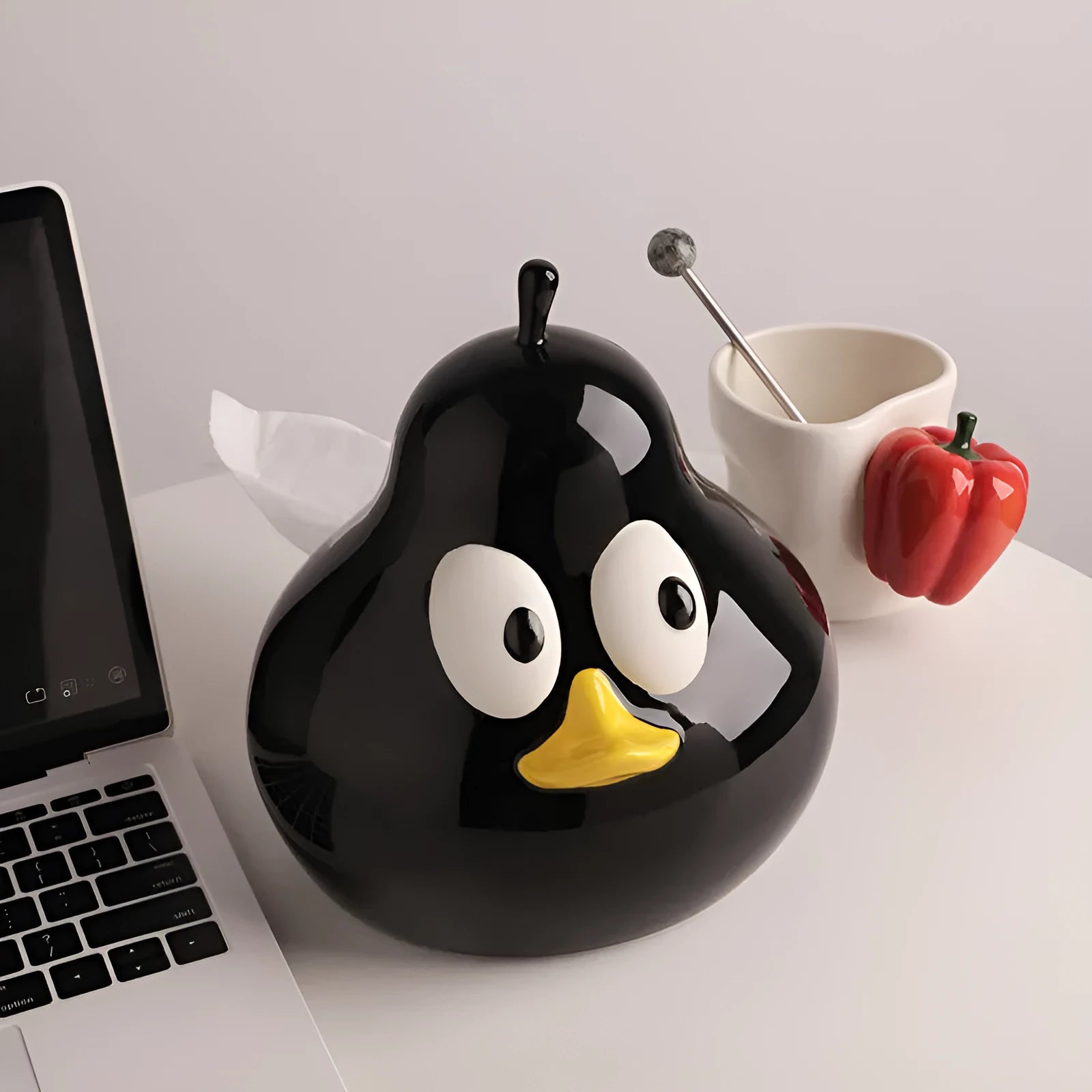Ceramic pear-shaped tissue box holder in cute animal style with green glaze finish